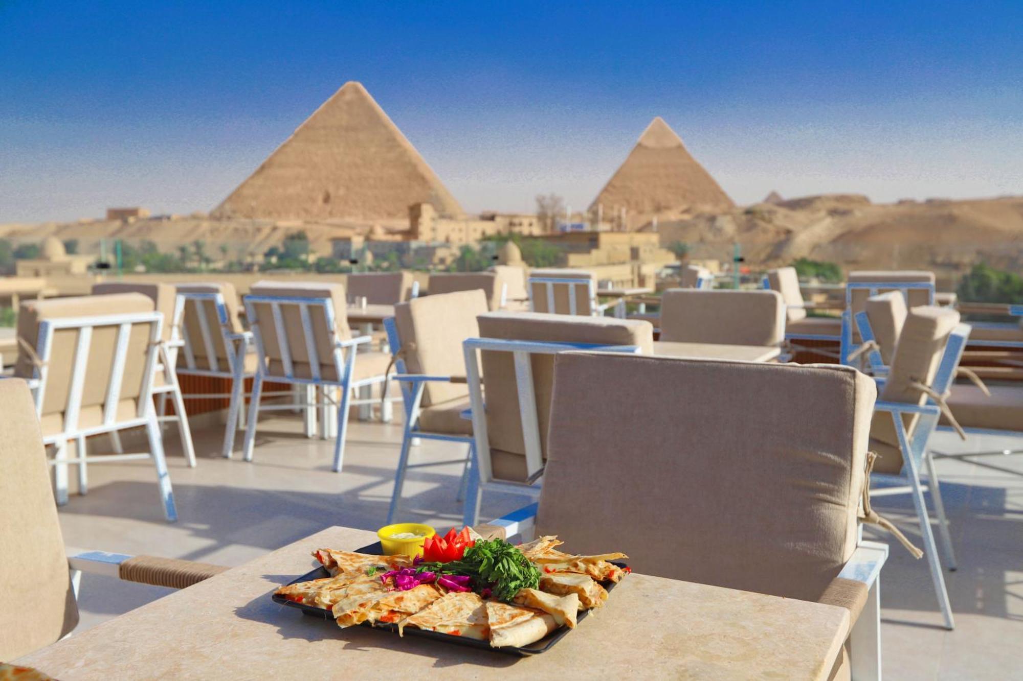 Gaia Pyramids Hotel Kafret el-Gabal المظهر الخارجي الصورة