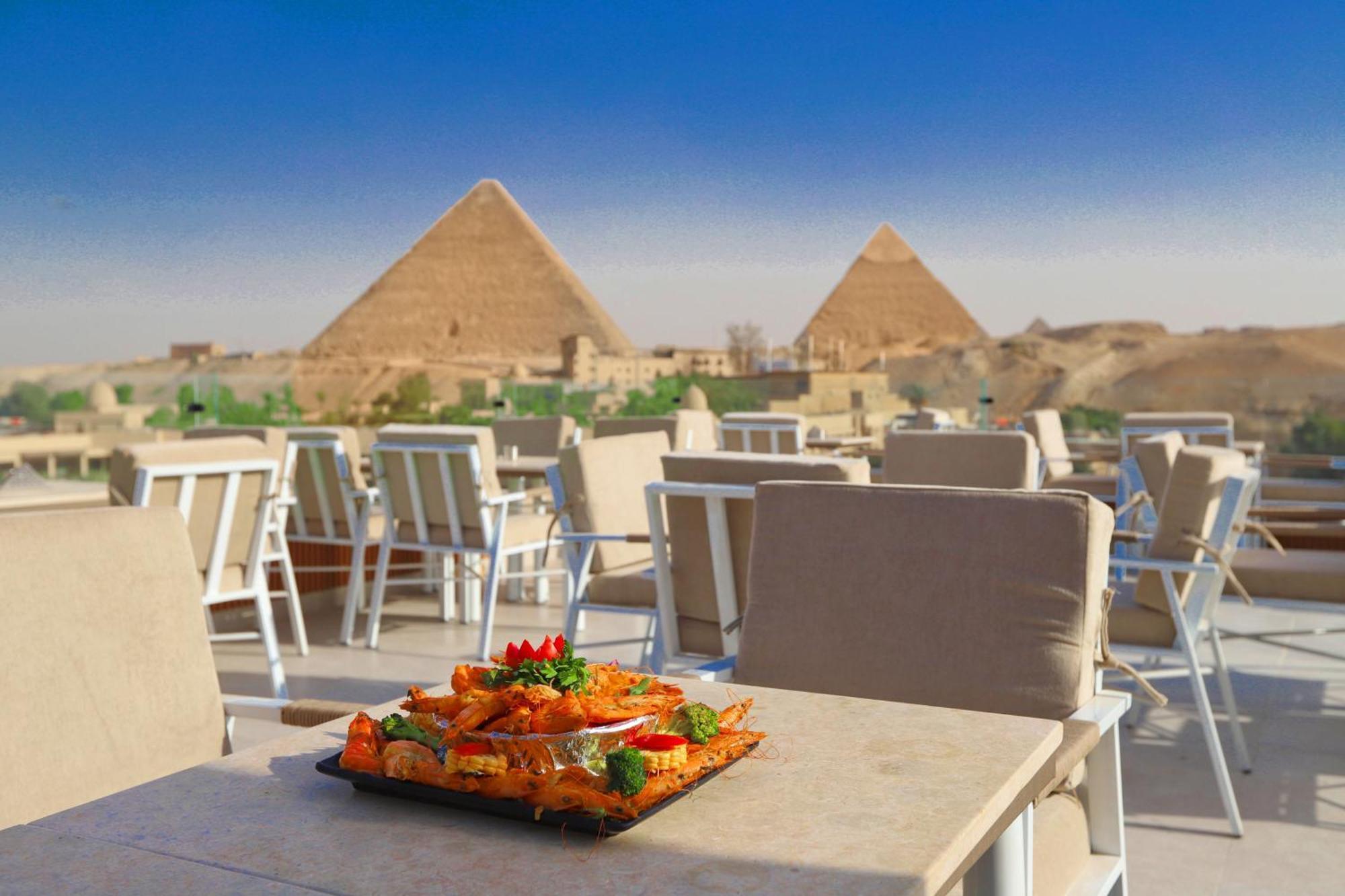 Gaia Pyramids Hotel Kafret el-Gabal المظهر الخارجي الصورة