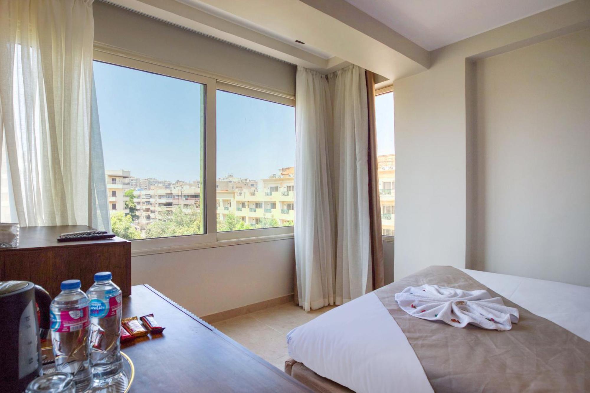 Gaia Pyramids Hotel Kafret el-Gabal المظهر الخارجي الصورة
