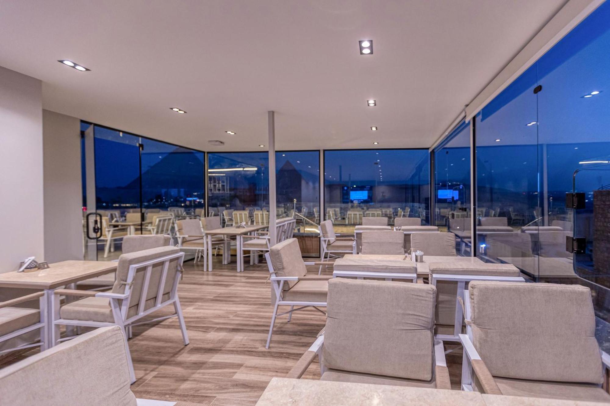 Gaia Pyramids Hotel Kafret el-Gabal المظهر الخارجي الصورة